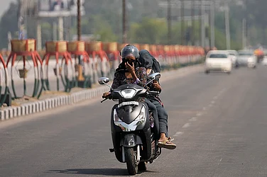 | Photo: AP/Channi Anand